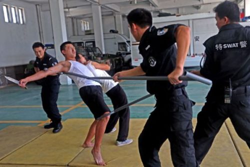 Featured Image Of Police Officers Training With Non Lethal Weaponry Types.