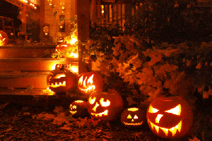Gif Of A House Front Halloween Decorated.