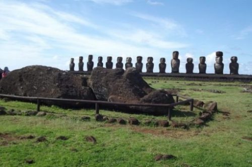 Featured Topic Image Of A Landscape View Row Of Easter Island Stone Giant Statues. Front One Lying Down.