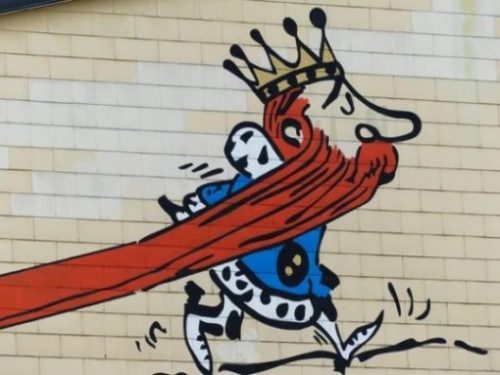 Image Of Graffiti Art Of A Long Red Bearded King Walking.