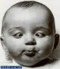 Image Closeup Of A Baby Squinting.