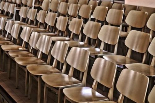 photocredit/thanks:michael-gaida:pixabay Featured Image Focusing On Several Rows Of Empty Chairs.