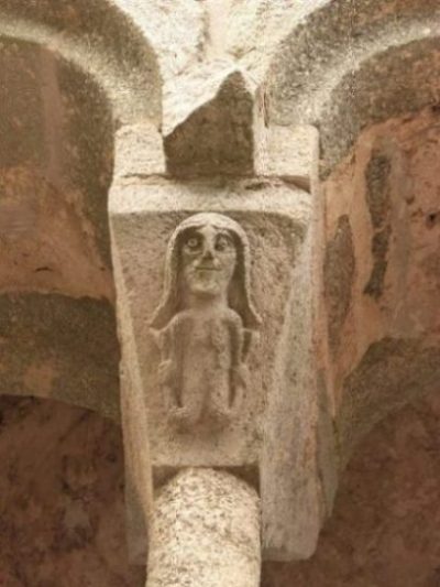 Image Of A Stone Lintel/Portal With A Legendary Siren Carved Upon.