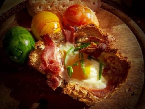 Image Of A Serve Of Continental Savory Bread Muffin, Egg, Bacon Strip, Herbs.