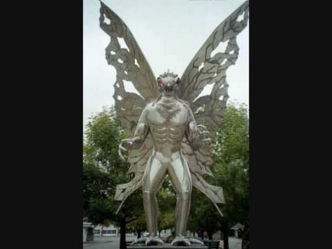 Image Of A Statue Of Mothman.